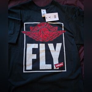 Brand New With Tags Jordan x Levi Tee Black Size Medium.